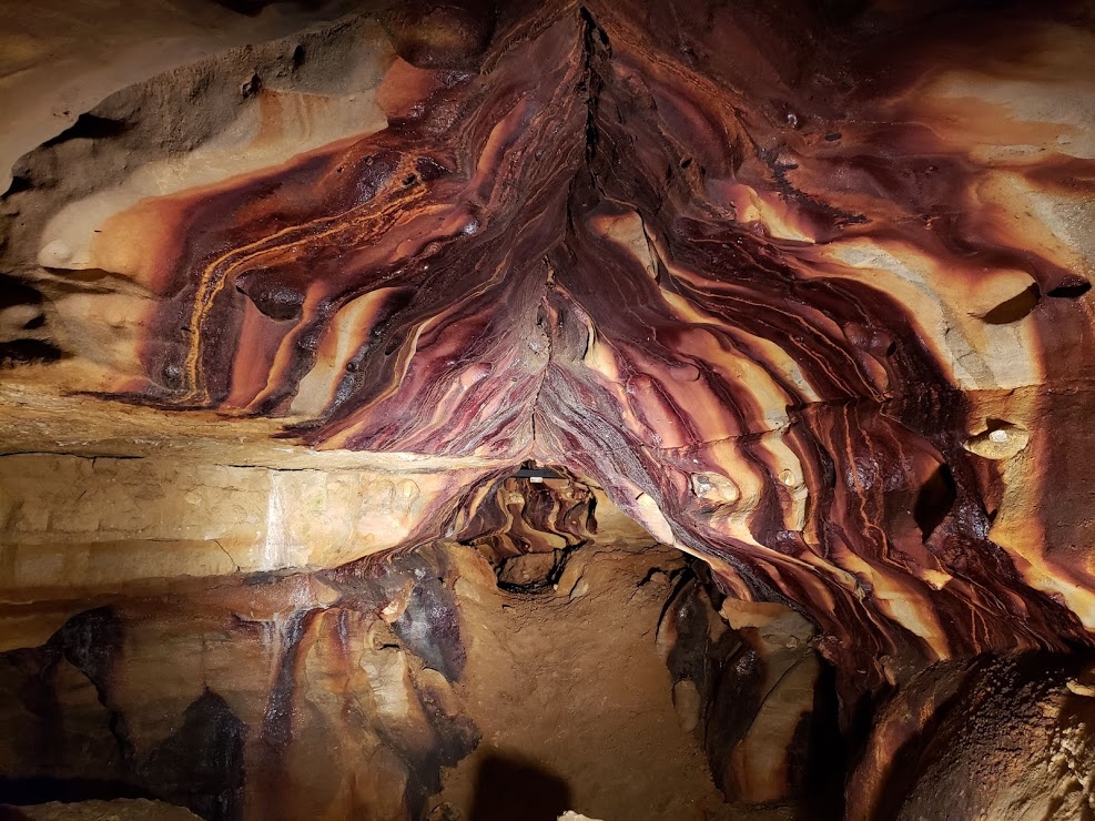 A photo showing the inside of the Ohio Caverns. It has a mirrored reflection from standing water. Photo retrieved from Ohio Caverns website.