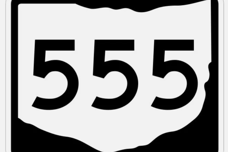 An illustration of the Ohio State Route 555 sign. It is a black background with a white shape of the state of Ohio with black numbers.